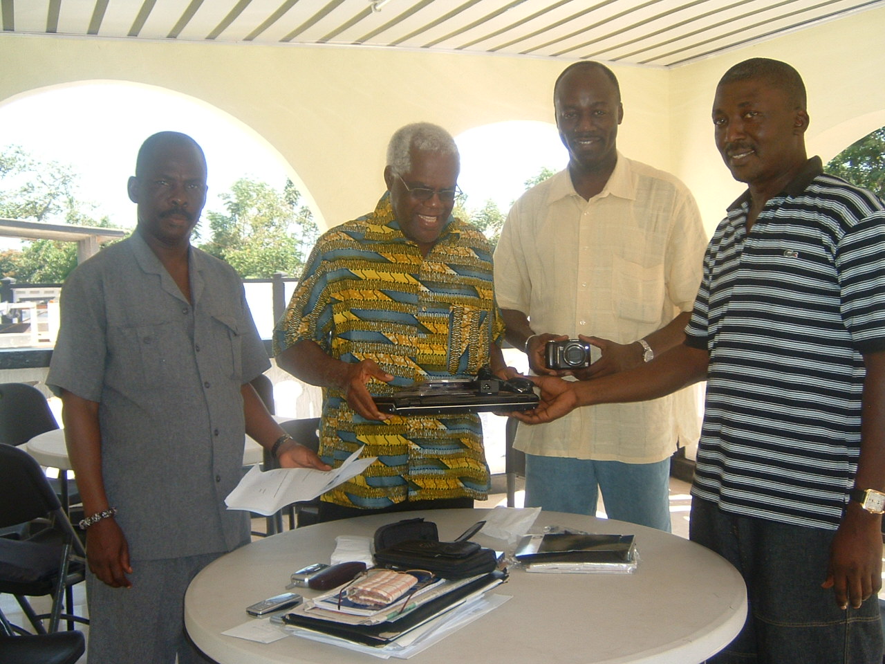 Presentation of a laptop and digital camera to the alumni office staff